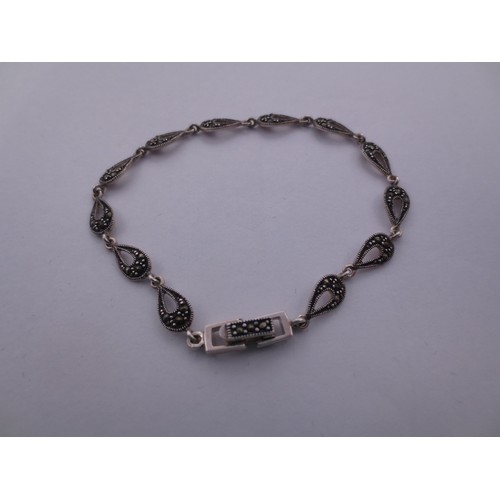 77 - A 925 silver and marcasite bracelet,  and a butterfly brooch stamped silver