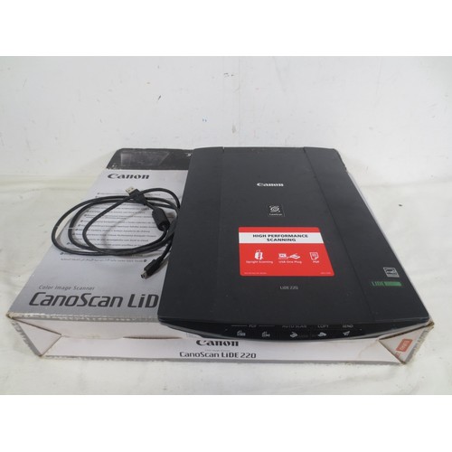 An a/f Canon Canoscan Lide 220 color image scanner with box, and an a/f ...