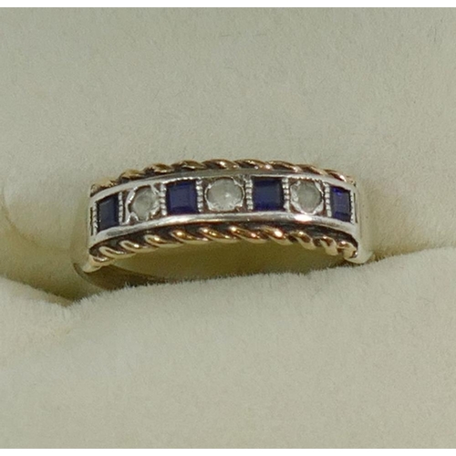 182 - A sapphire and diamond oval cluster ring, the shank stamped '925', finger size O 1/2, and a silver s... 