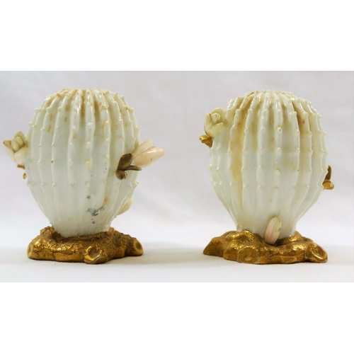 22 - A pair of small Victorian Moore Brothers porcelain cactus vases, on gilt bases, 8.8cm high