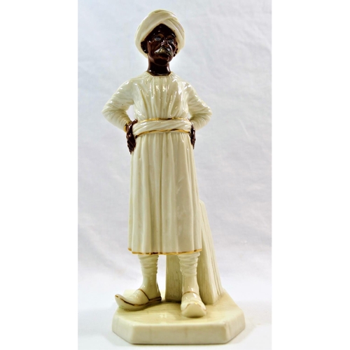 24 - A Worcester porcelain figure of an Indian gentleman standing with his hands on his hips, wearing a t... 