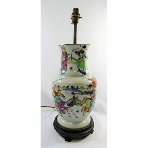 45 - A 19th century Chinese famille rose vase, decorated in enamels with a battle scene, converted to a l... 