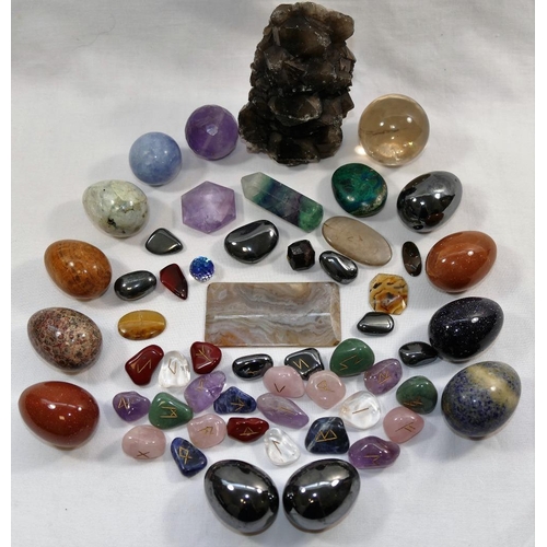 68 - A small rock crystal ball, 4.5cm diameter, a collection of polished rune stones, various hardstones ... 