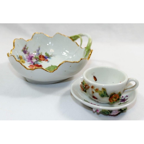 9 - A Meissen porcelain cabbage leaf dish, hand painted with a floral spray and cobnuts, crossed swords ... 