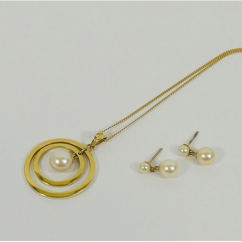 107 - A yellow metal and cultured pearl pendant stamped '14K', 2.5cm diameter, 4.3g gross, and a 9 carat g... 