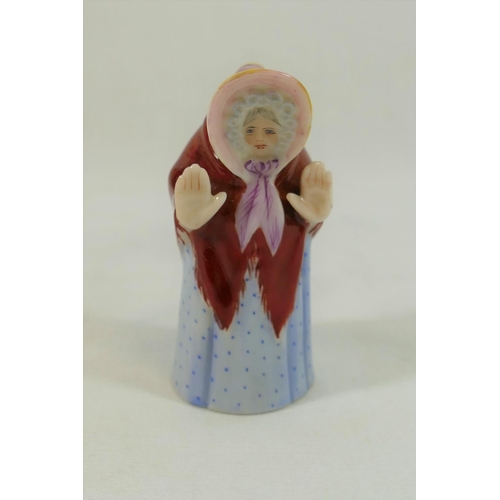 18 - A Royal Worcester porcelain candle snuffer, 'Granny Snow', puce mark, c.1903, 7.5cm high