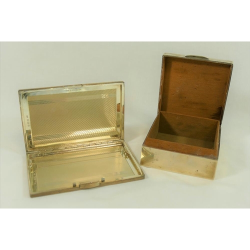 215 - A George V rectangular silver cigarette case with engine turned decoration, Birmingham 1932, in orig... 