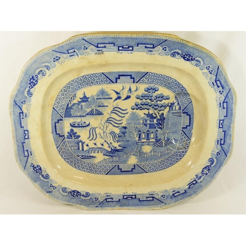 32 - A large 19th century blue and white willow pattern meat platter by John Carr and Co. of Low Lights P... 