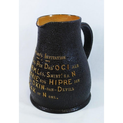 45 - A Royal Doulton tavern jug in the form of a leather jack, with tube lined poem 'The Landlord's Invit... 