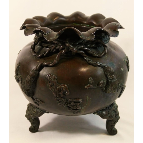 53 - A Japanese bronzed koro, cast in the form of a bag tied up with a cord, with one foot lacking, 22cm ... 