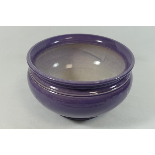 7 - A Bretby pottery bowl, with purple glaze, 21cm diameter