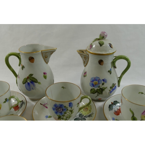 3 - A Herend porcelain part coffee service, comprised of seven cups, eight saucers, coffee pot and milk ... 