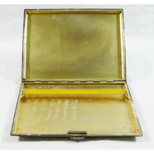 111 - A large rectangular silver cigarette case, Birmingham 1929, with engine turned decoration and gilt i... 