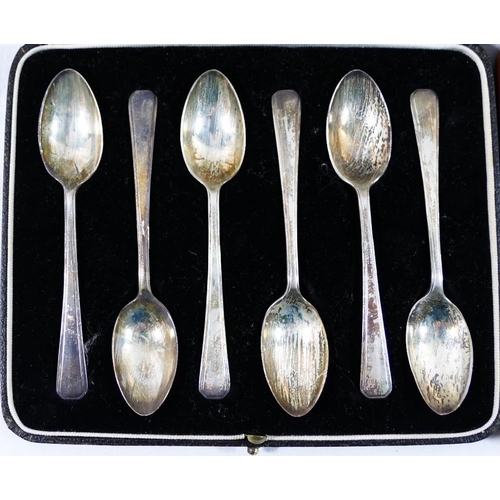 131 - A set of six silver teaspoons, London 1938, combined weight 2.13ozt, 66.3g, cased, and another set o... 