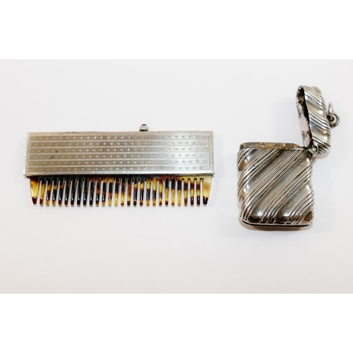 143 - A small silver cased retractable comb with import marks for London 1926, with engine turned decorati... 