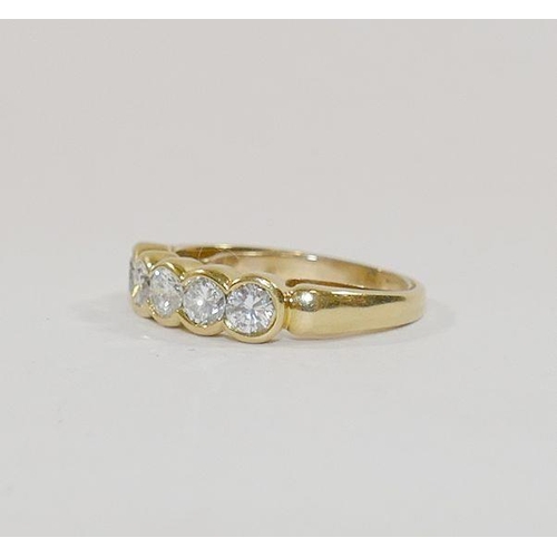 167 - A yellow metal diamond five stone ring, the five round brilliant cut stones each approximately 0.16 ... 