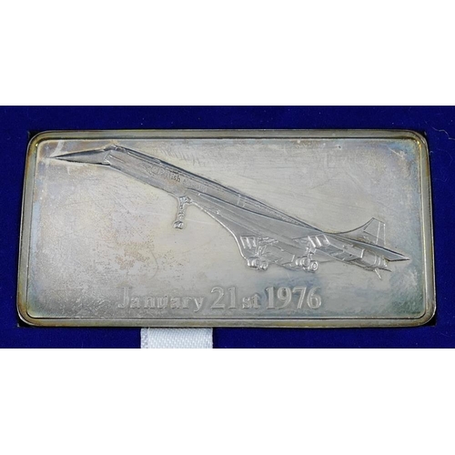 204 - Concord Interest - A Danbury Mint ingot commemorating Concorde's first flight, 21 January 1976, with... 