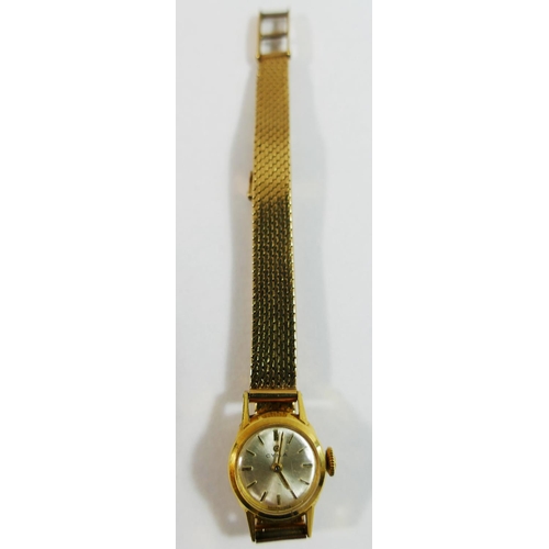 211 - An 18 carat gold cased Cyma ladies bracelet watch, the circular face with silvered dial and gilt bat... 