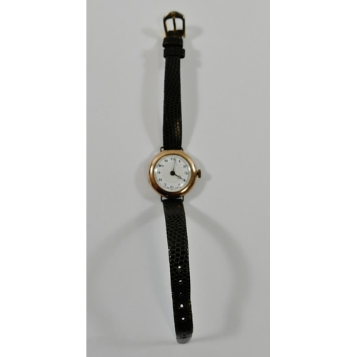 214 - A 9 carat gold cased ladies Buren wrist watch, London 1928, the white dial with Arabic numerals, wit... 