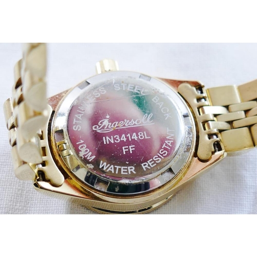 215 - An Ingersoll ladies gold plated bracelet watch with mother of pearl dial, date aperture and sapphire... 