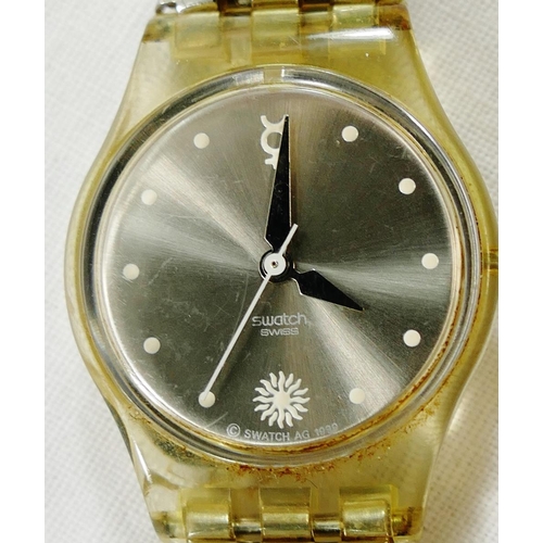 216 - A ladies Gucci stainless steel bracelet watch, the square plain black face within stylised 'G' surro... 