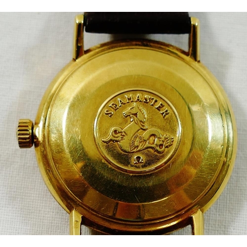 217 - A 1960's yellow metal cased gentleman's Omega Automatic Seamaster wrist watch, the champagne dial wi... 