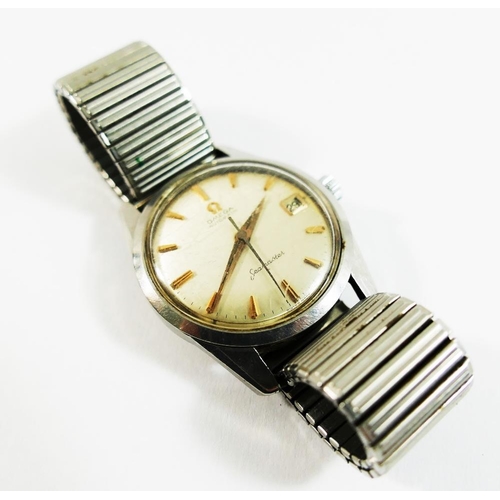 219 - A 1960's gentlemans Omega Seamaster Automatic wrist watch, the silvered dial, with date aperture, gi... 