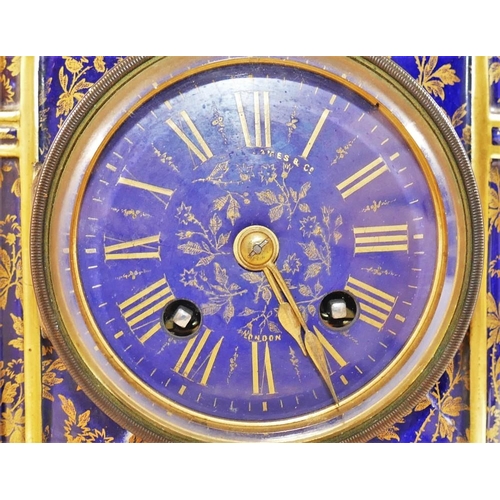 235 - A Victorian Wedgwood bone china cased mantle clock and vase garniture, the cobalt blue ground clock ... 