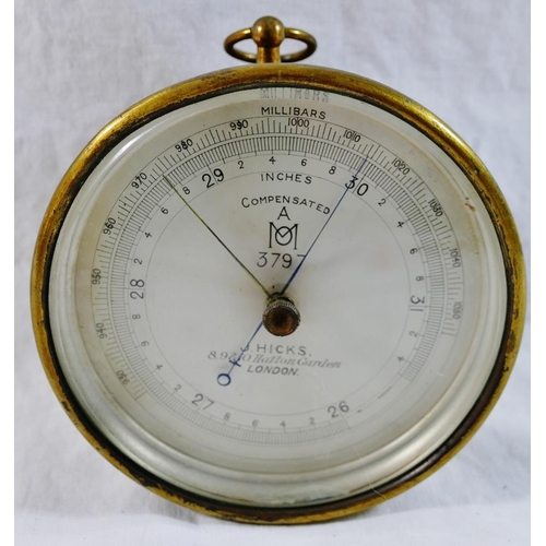 237 - An Air Ministry Met Office brass cased compensated hanging aneroid barometer by J Hicks of Hatton Ga... 