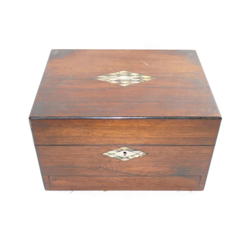 241 - A Victorian rosewood toiletry box, the lid and escutcheon with inlaid mother of pearl and abalone de... 