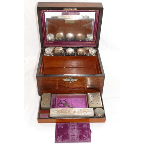 241 - A Victorian rosewood toiletry box, the lid and escutcheon with inlaid mother of pearl and abalone de... 