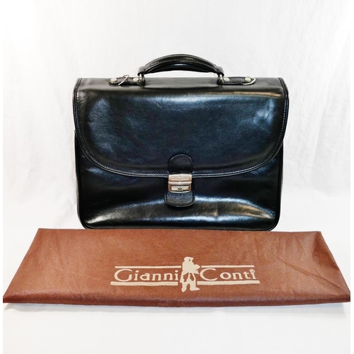 249 - A Gianni Conti black leather case, 39cm across x 32cm high (including handle), with original dust/st... 