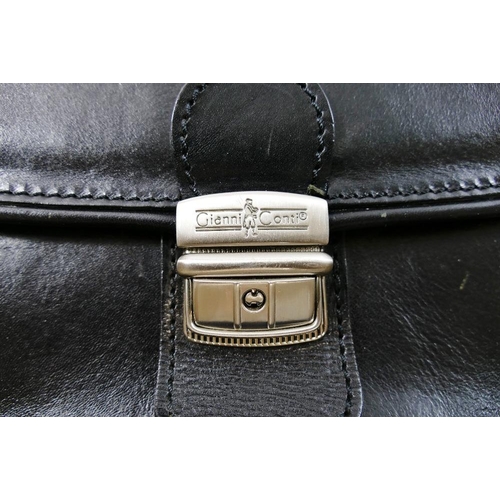 249 - A Gianni Conti black leather case, 39cm across x 32cm high (including handle), with original dust/st... 