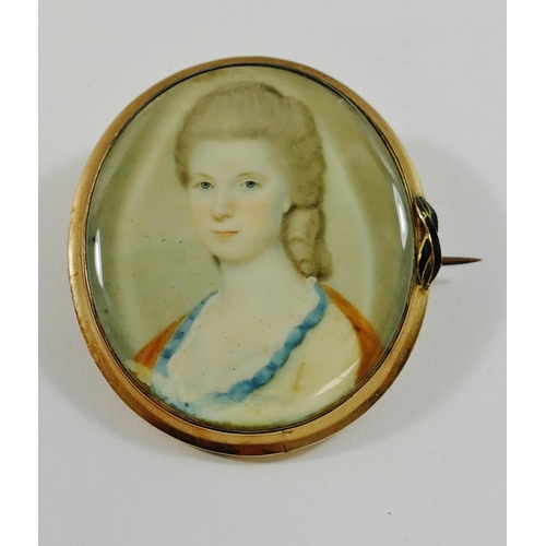 308 - A Victorian oval portrait miniature on ivory of Janet Mitchelson, housed in gold and black enamel br... 