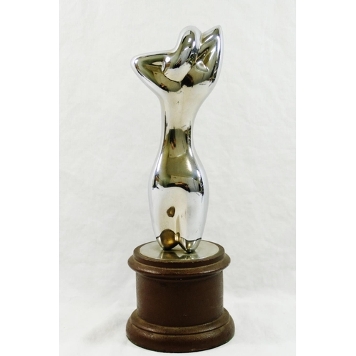 311 - A chrome plated figure of a nude, in a similar pose to Man Ray's 'Herma', unsigned, 20cm high, on pa... 