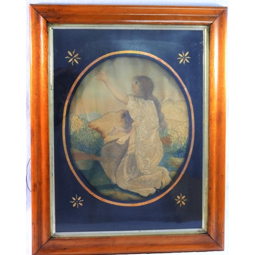 41 - A 19th century oval embroidered silk picture of a young woman kneeling with her arms aloft, 28cm x 2... 