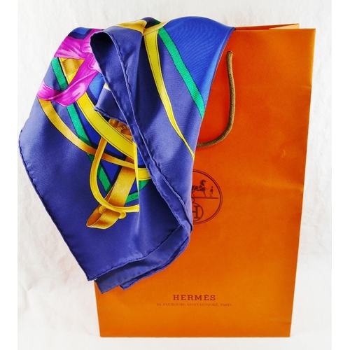 42 - A Hermes blue ground 'Grand Manège' silk scarf, by Henri d'Origny, 89cm x 89cm, with bag