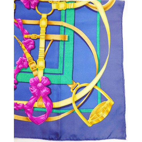 42 - A Hermes blue ground 'Grand Manège' silk scarf, by Henri d'Origny, 89cm x 89cm, with bag