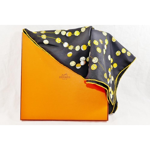 43 - A Hermes 'Dancing Pearls' black ground silk scarf, designed by Virginie Jamin, 89cm x 89cm, with ori... 