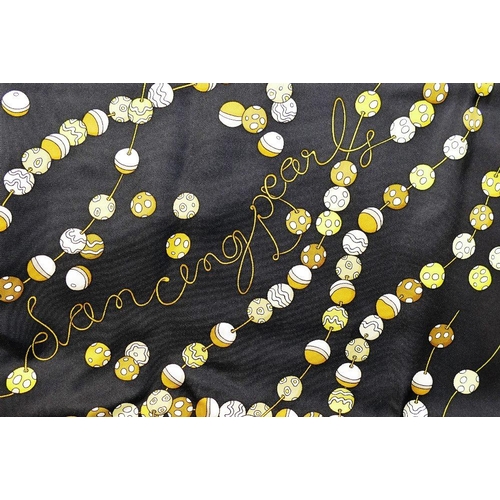 43 - A Hermes 'Dancing Pearls' black ground silk scarf, designed by Virginie Jamin, 89cm x 89cm, with ori... 