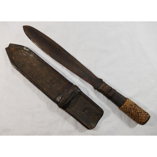 50 - An antique steel tribal dagger/knife, the hollow handle with braided reed grip and ornamentation, 41... 