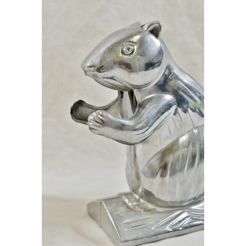 64 - A chrome plated Chevrolet 'Chevy' eagle car mascot, 14.5cm long, base 7.5cm diameter, and a novelty ... 