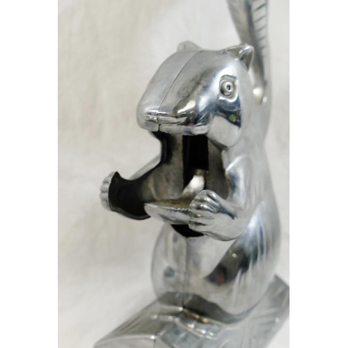 64 - A chrome plated Chevrolet 'Chevy' eagle car mascot, 14.5cm long, base 7.5cm diameter, and a novelty ... 