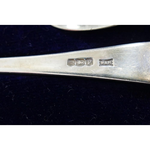 89 - A set of six silver teaspoons, Sheffield 1932 by Walker and Hall, with golf club decorated terminals... 