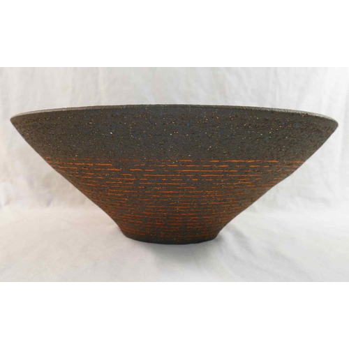 320 - Ann Hitchcock (20th/21st century British)+ Stoneware pottery bowl with glazed interior and orange ba... 