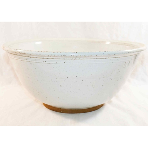 321 - Nick Membury (20th/21st Century British)+ A large white and speckled glazed bowl, maker's mark below... 