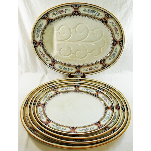 14 - A large quantity of Minton 'Chinese Key' dinnerware comprised of two large oval serving plates, 55cm... 