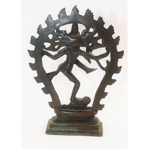 37 - A small Indian bronze of the Hindu goddess Kali, raised on rectangular plinth, 10.2cm high