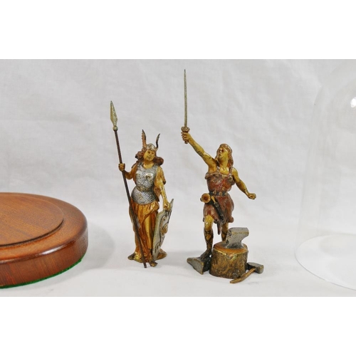39A - Two small modern cold painted bronze Classical figures of a Valkyrie and a blacksmith, on turned woo... 