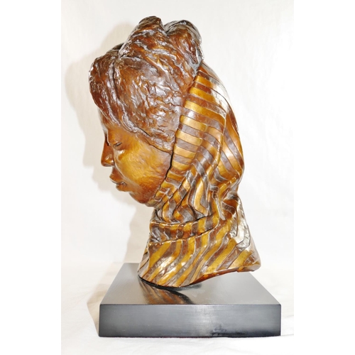 47 - A head study of an African lady wearing a scarf, bronze with gilt detail, on rectangular plinth, ini... 